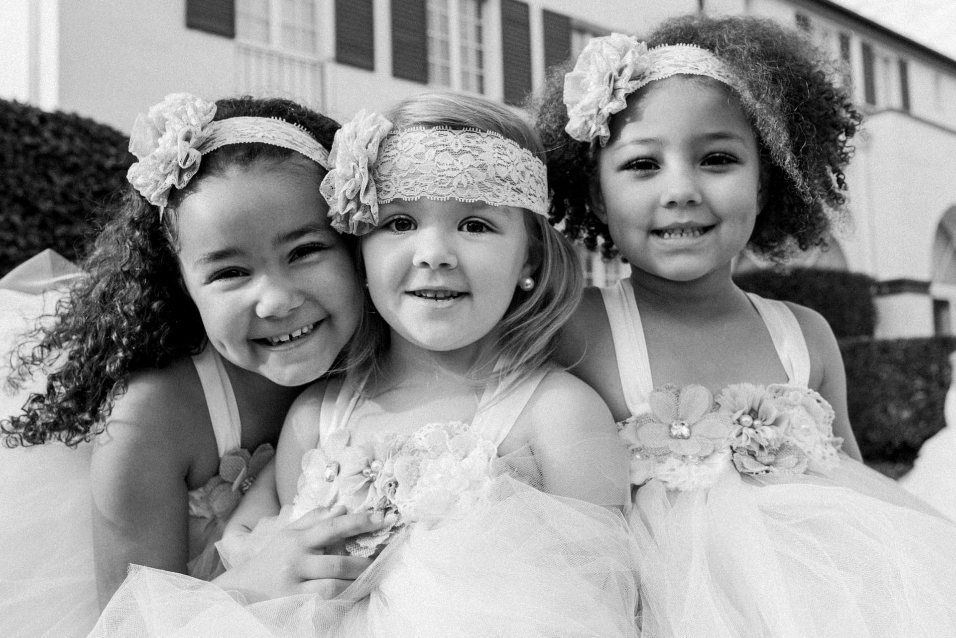 black and white photograph of flower girls