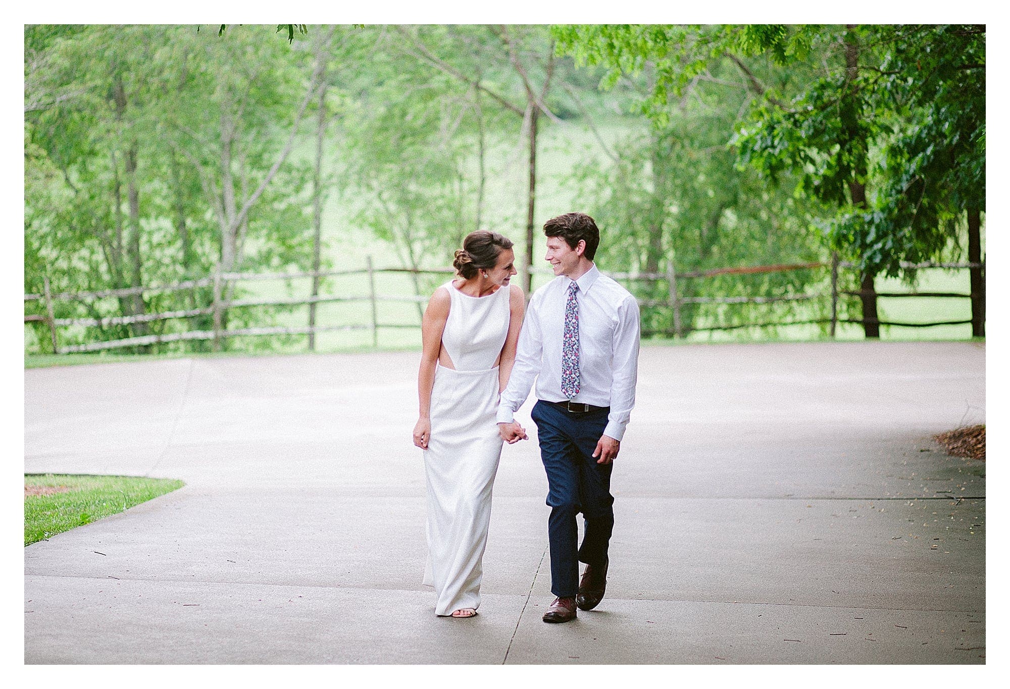Bride and Groom laughing and holding hands.  Photo by Asheville Wedding Photographer Kathy Beaver