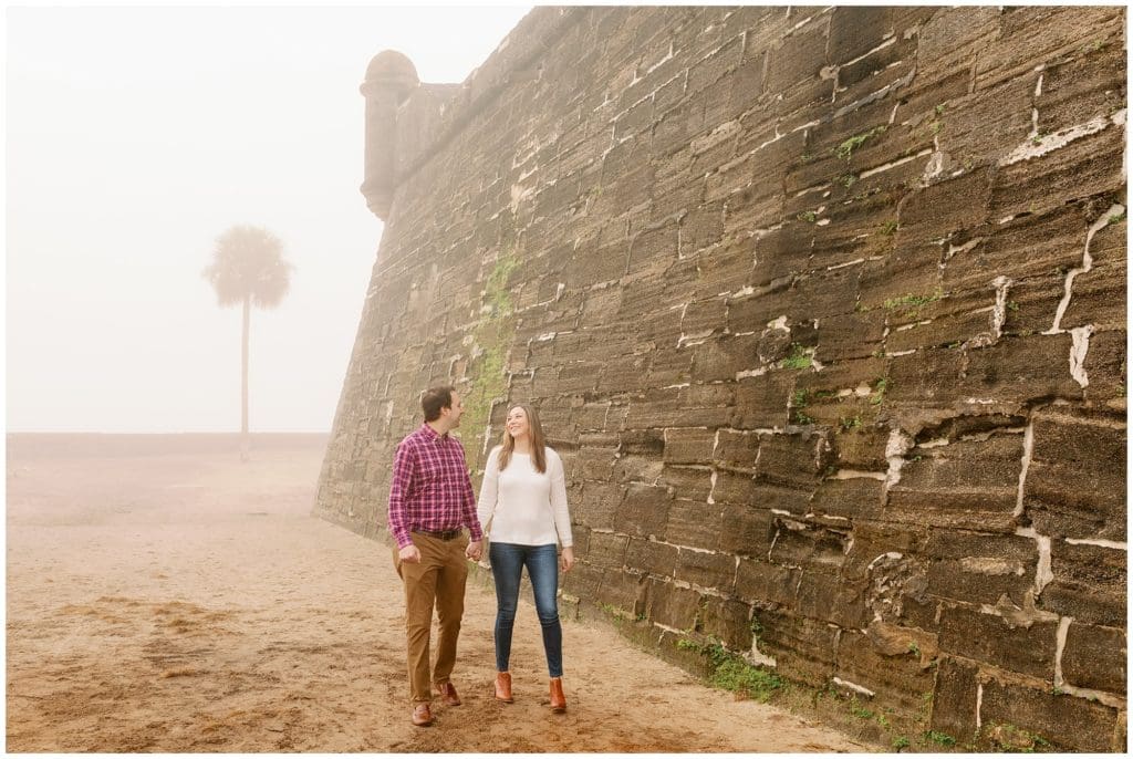 St Augustine beach engagement session in the winter with fog.