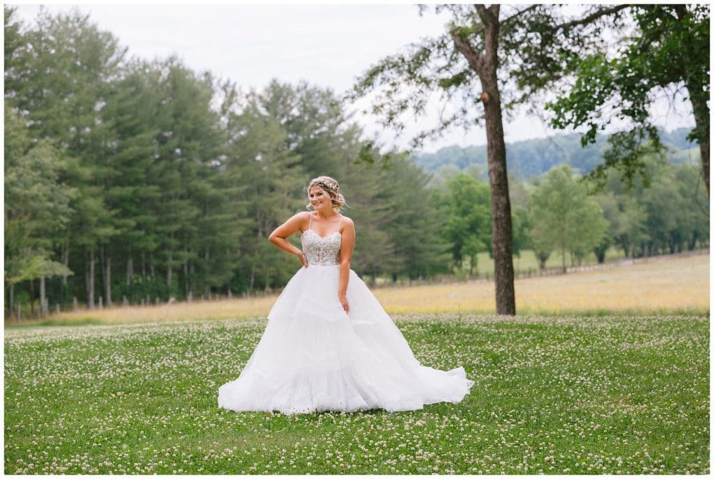 Bridal portrait in a field of white wildflowers.