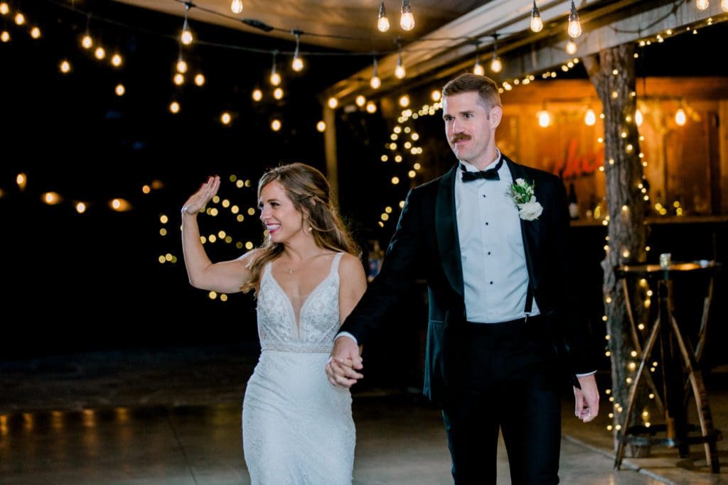 The bride and groom enter their reception | Kathy Beaver Photography | Asheville Wedding Photographer