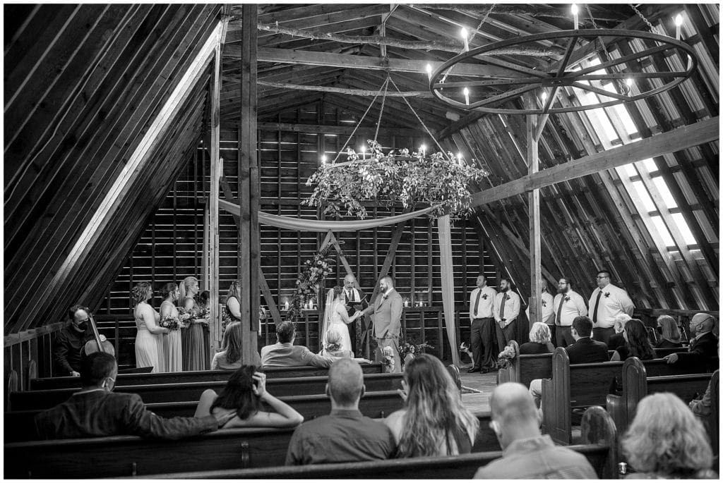 Black and white ceremony photo inside the barn at Honeysuckle Hill | Asheville Wedding Photographer