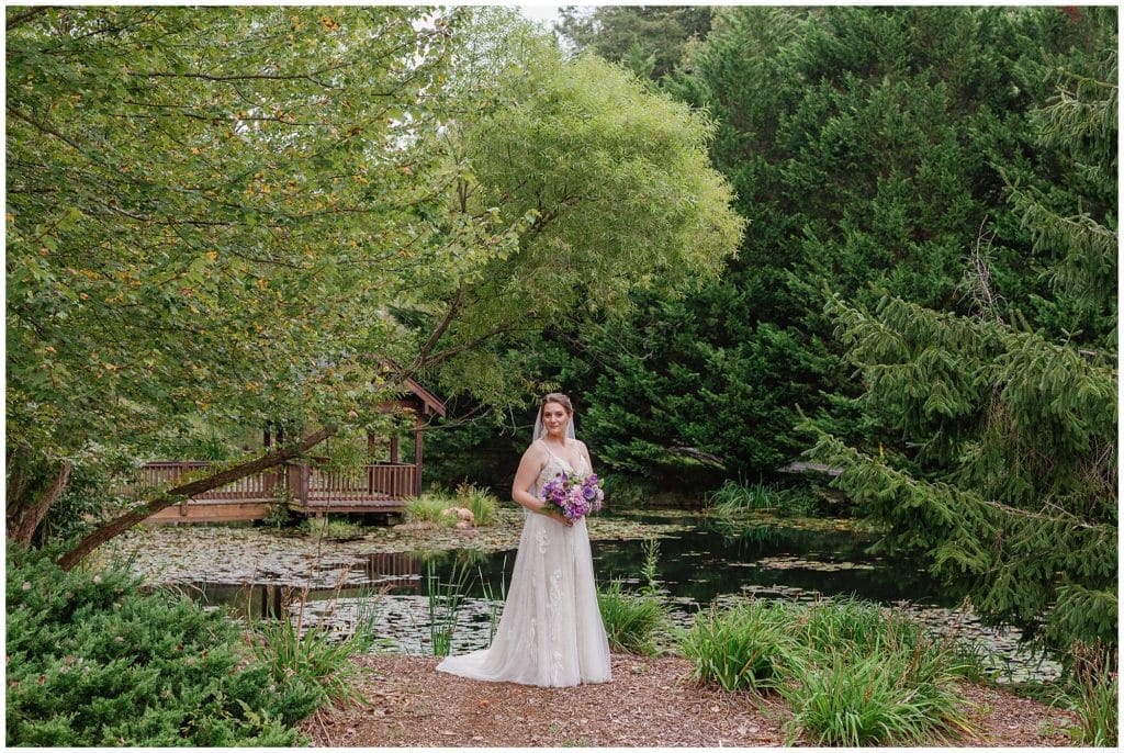 Bridal portrait with a purple bouquet at Honeysuckle Hill  | Asheville Wedding Photographer
