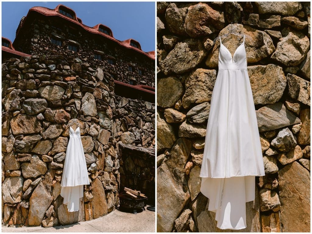 A satin wedding gown hanging at the Omni Grove Park inn in Asheville | Kathy Beaver Photography
