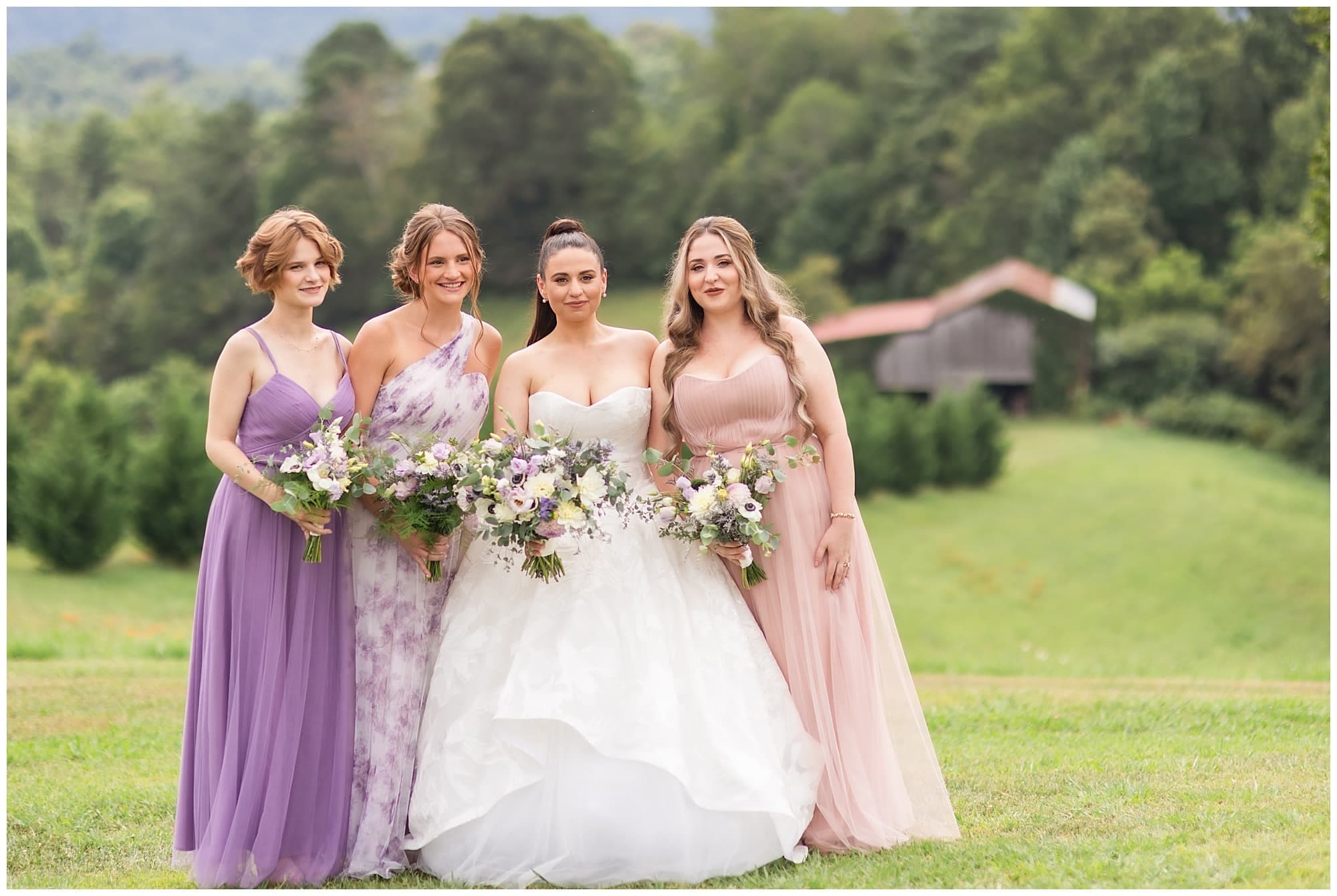 Bride and bridesmaids with mountain backgroud