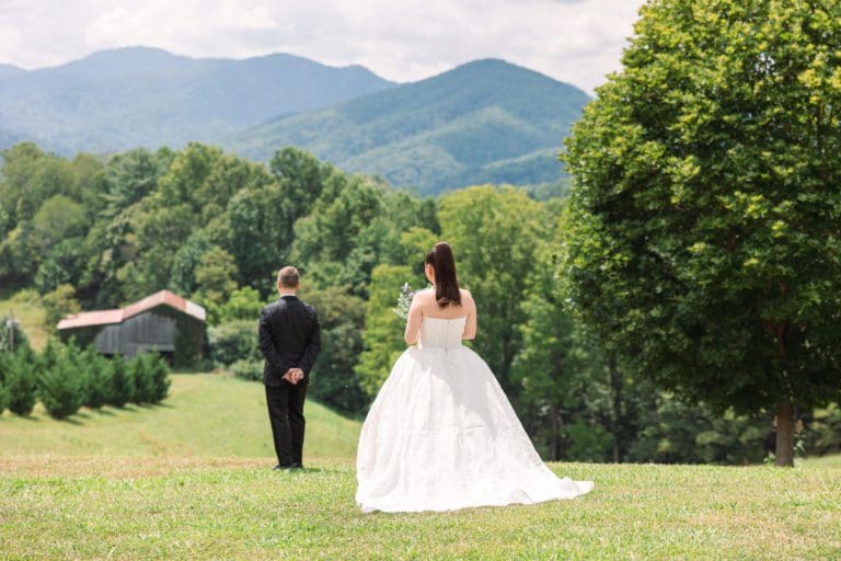 first look at the ridge wedding venue with mountains in the background