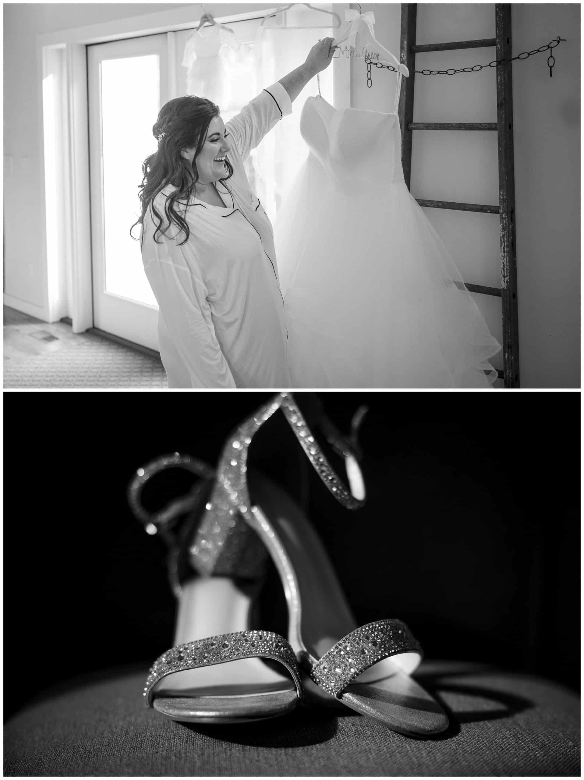 black and white photo of bride looking at her dress before putting it on