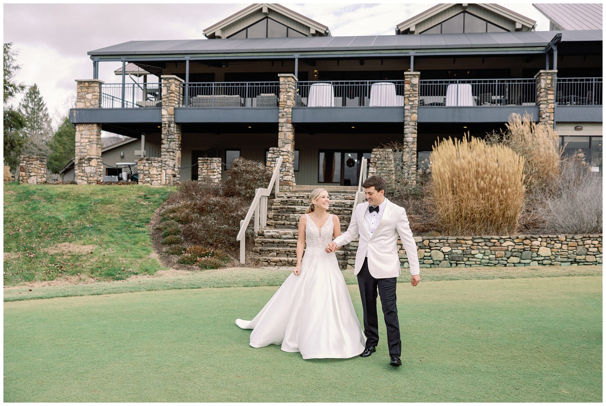 bride and groom photo in front of Asheville Country Club