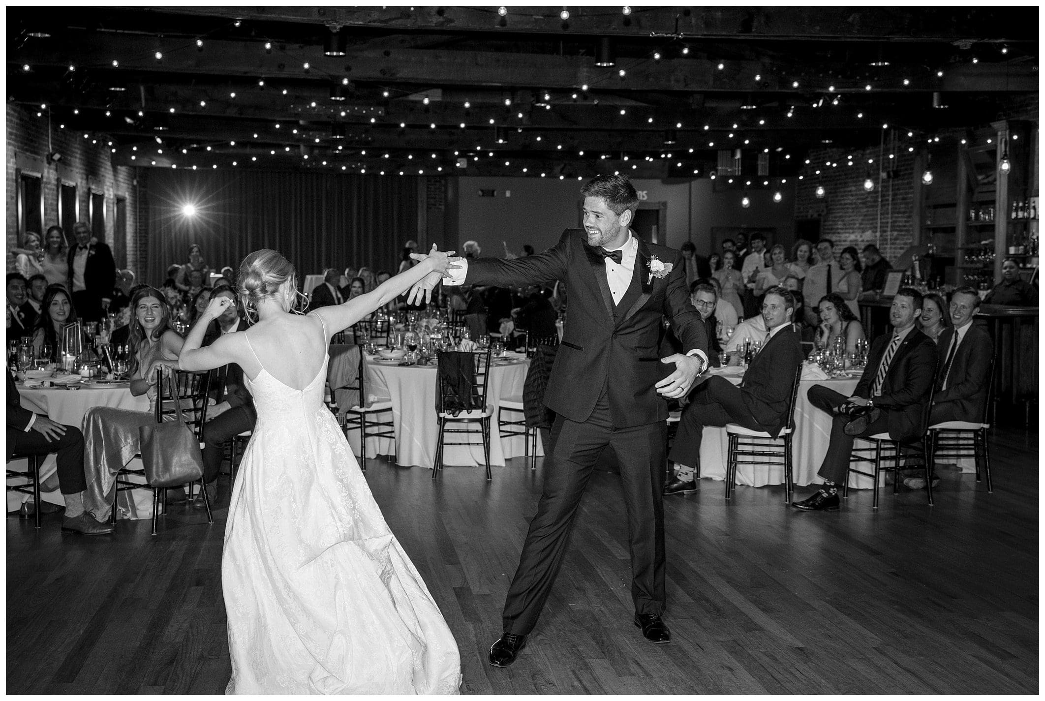 couple shares dance together for their downtown Asheville wedding Century Room 