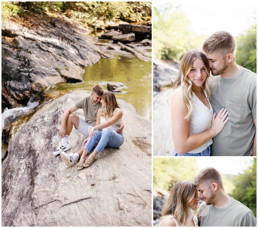 A couple sits on rocks near a creek during their engagement session.
