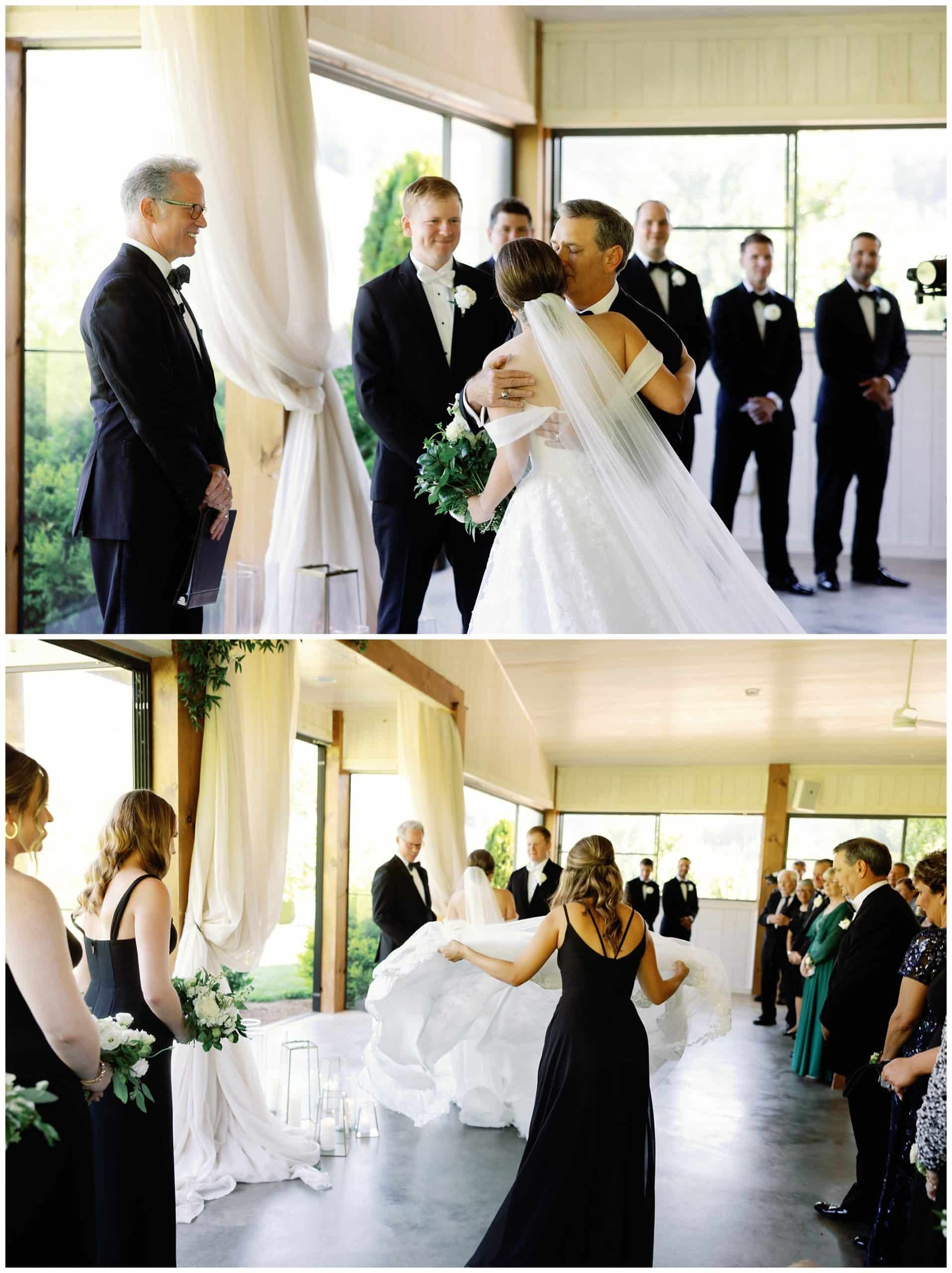 A bride and groom kissing during their wedding ceremony.