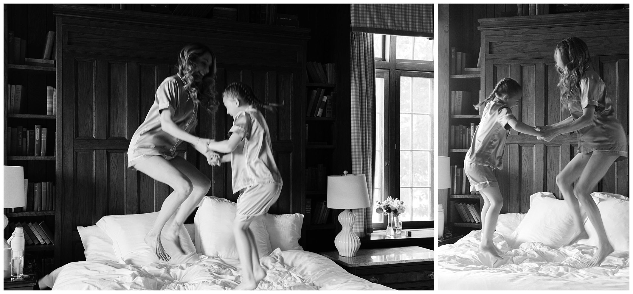 A woman and a girl jumping on a bed.