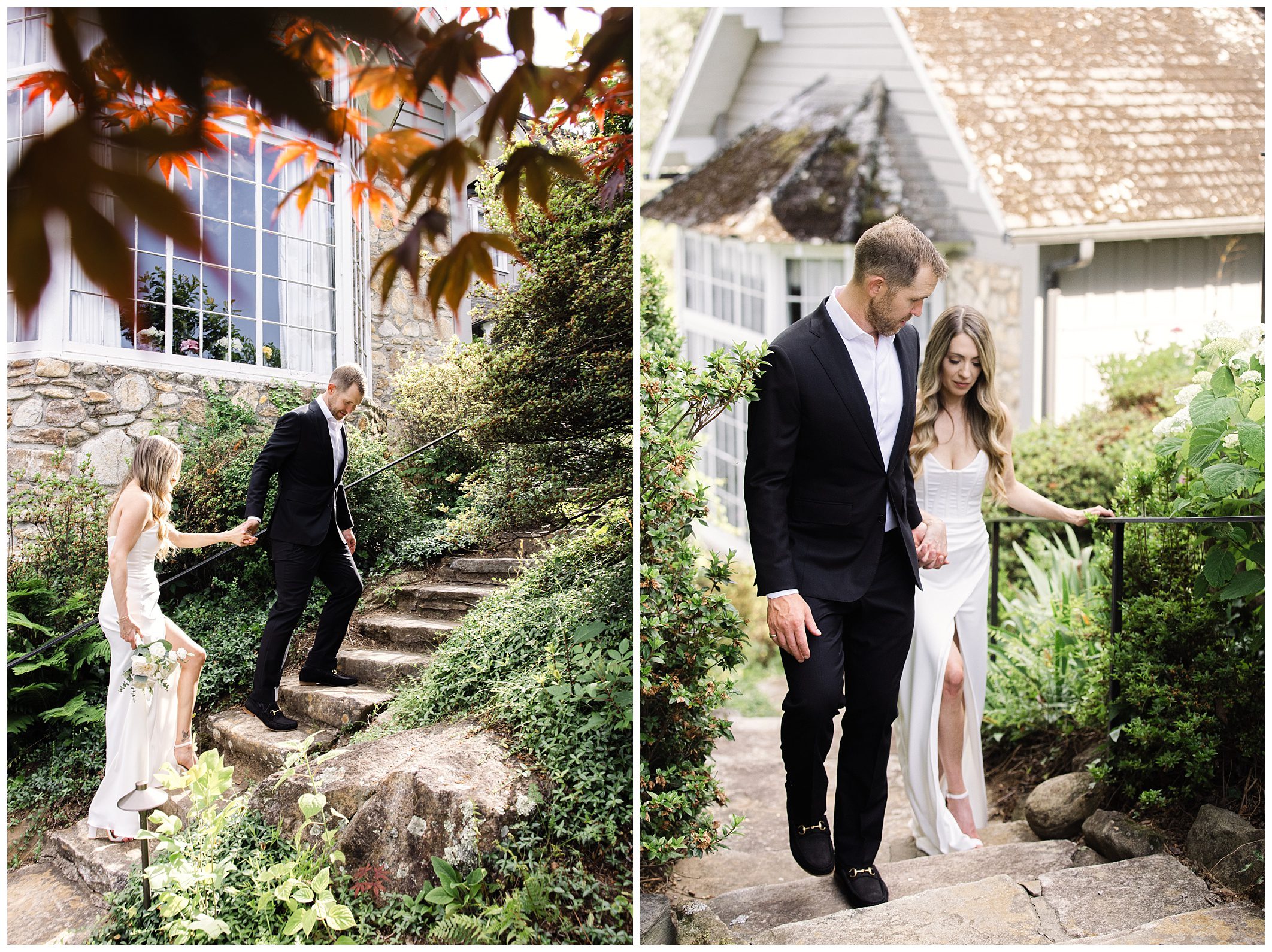 A couple dressed in formal attire ascend stone steps outside a house. The woman wears a white dress and holds flowers, while the man wears a black suit. They hold hands while walking up the stairs.