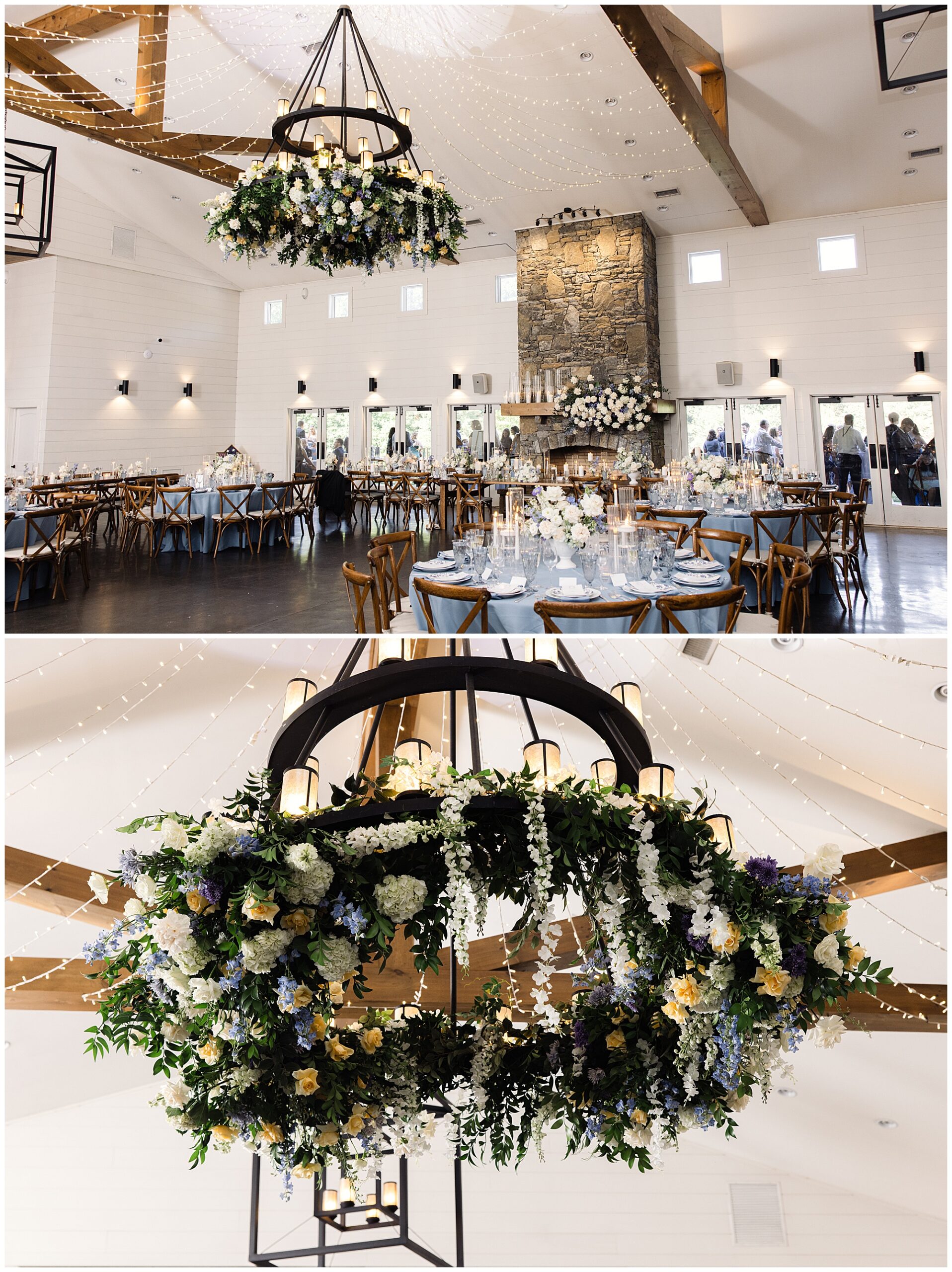 A spacious, well-lit event hall decorated for a formal event. The centerpieces include large floral arrangements and elegant chandeliers adorned with flowers and greenery. Tables are set for dining.