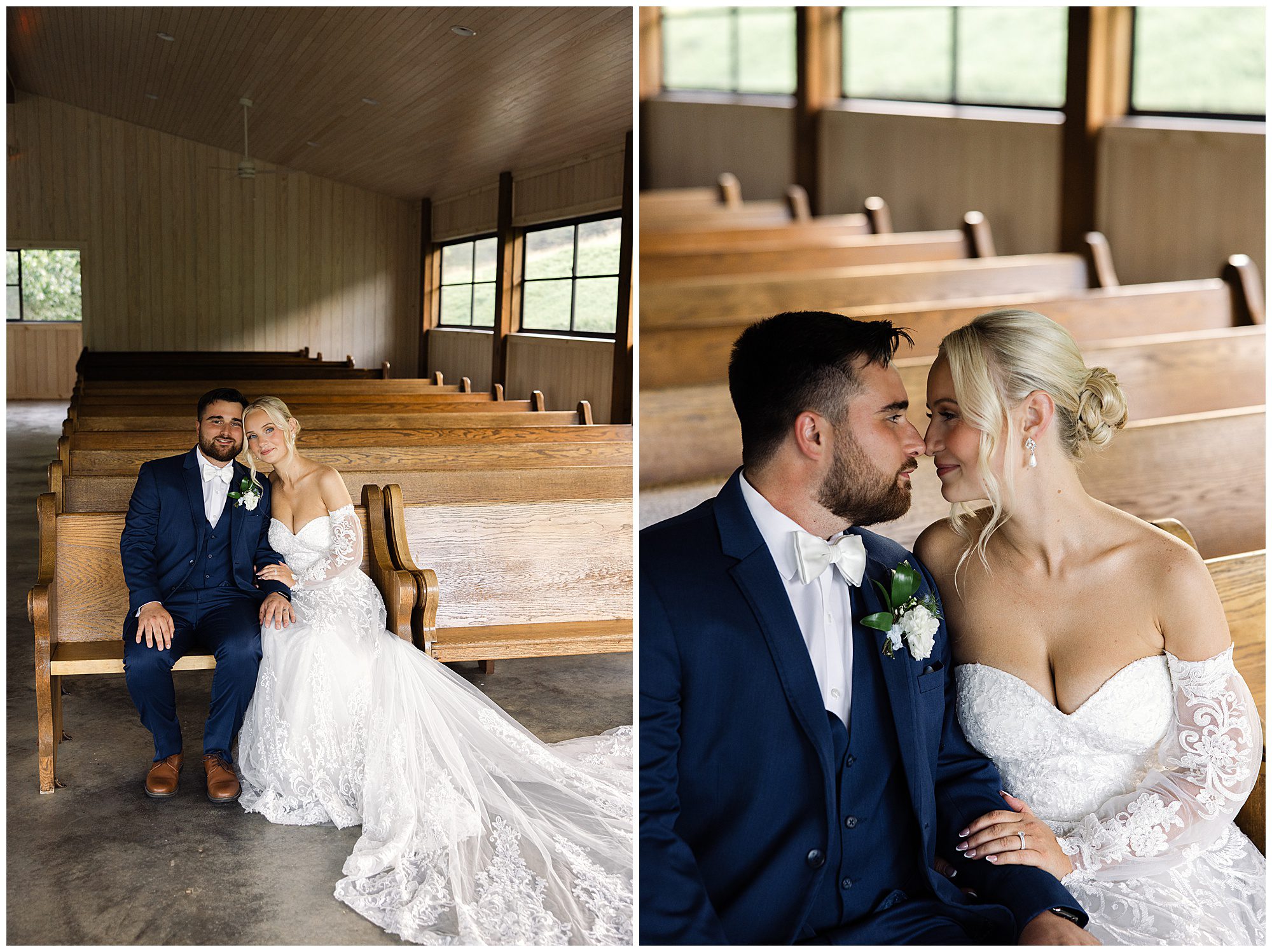 A bride and groom sit closely together on a wooden pew inside a church. The bride wears a lace gown, and the groom is in a navy suit with a bow tie. They share a moment, looking at each other affectionately.