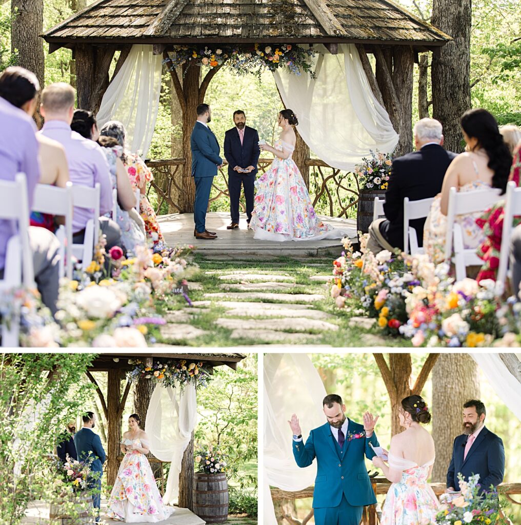 A Spring Garden Wedding outdoors under a wooden gazebo with a floral arch, attended by seated guests; the bride wears a floral dress and the groom a teal suit. Perfect for a charming Farm Wedding near Asheville NC.