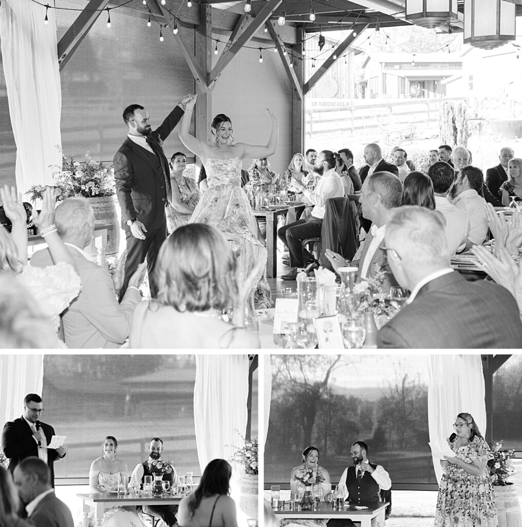 A couple celebrates at their Spring Garden Wedding reception in Asheville, NC, as guests watch and speeches are given at a beautifully decorated venue with seated attendees.