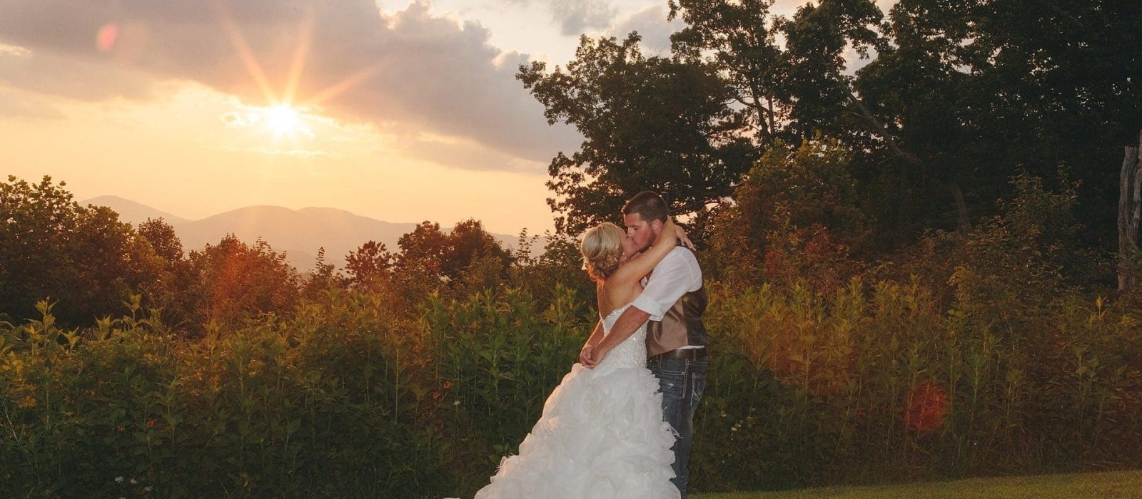 Bride and Groom at Sunset with mountains